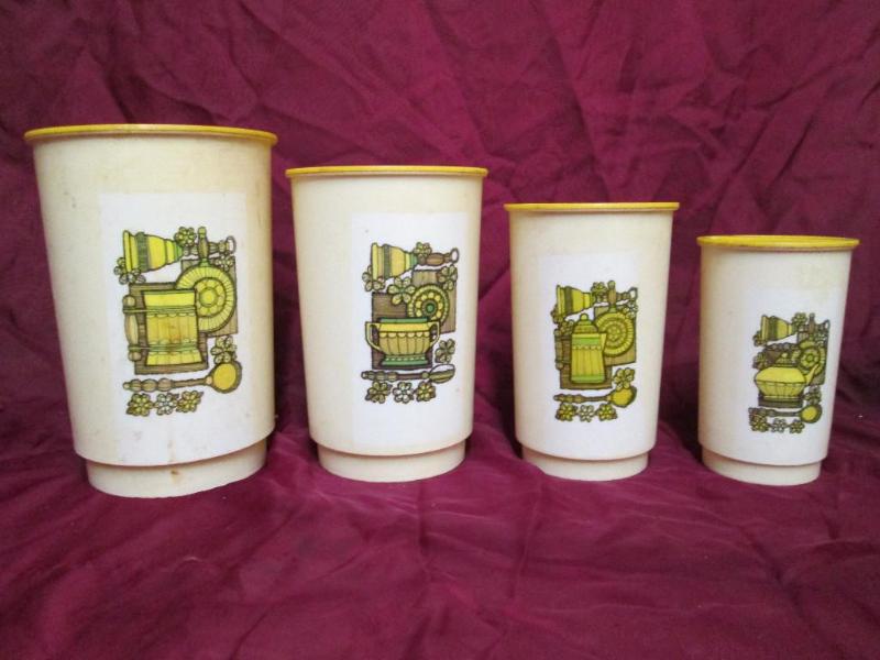 lot 27 image: Vintage canisters gold tops with of...