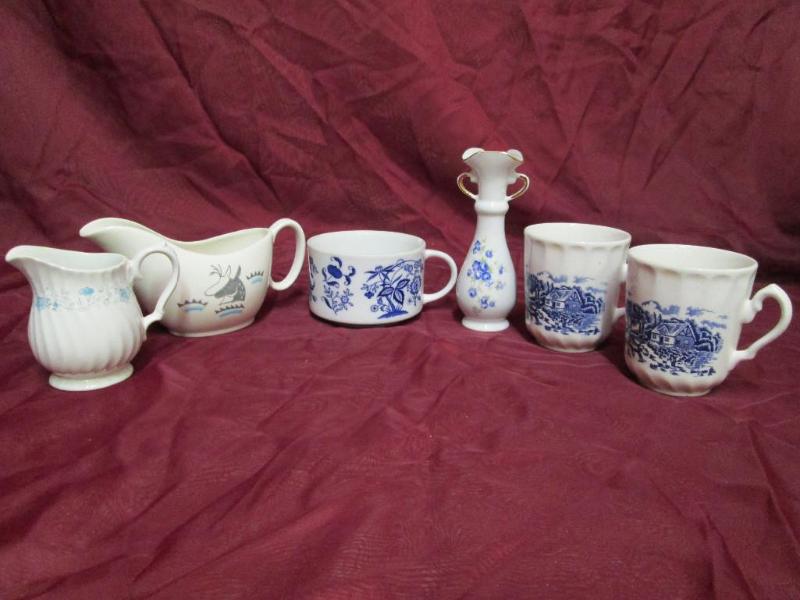 lot 48 image: Assorted white china cups and cream...