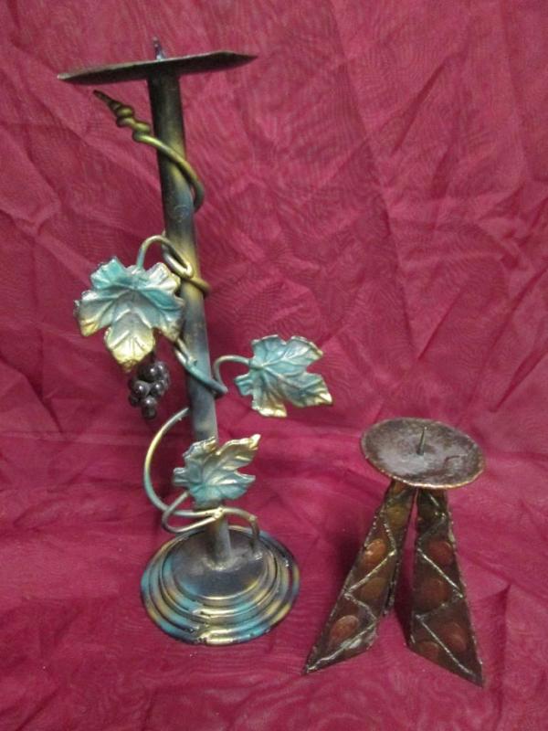 lot 92 image: Pair of unique candle holders for p...