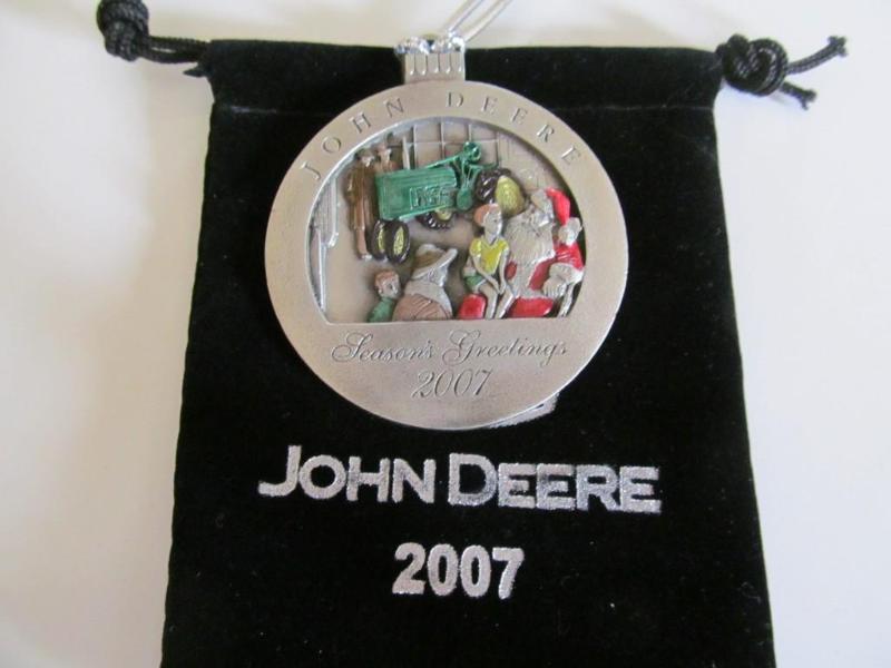 lot 11 image: John Deere Christmas ornament,2007...