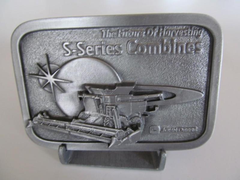 lot 16 image: John Deere belt buckle,brand new....