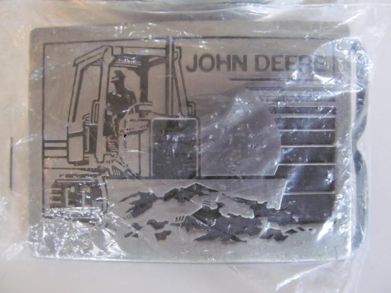 lot 19 image: John Deere belt buckle,brand new....