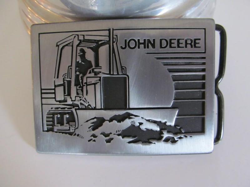 lot 21 image: John Deere belt buckle,brand new....
