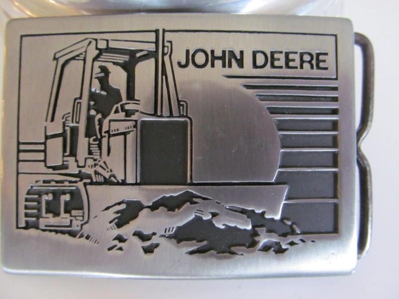 lot 22 image: John Deere belt buckle,brand new....