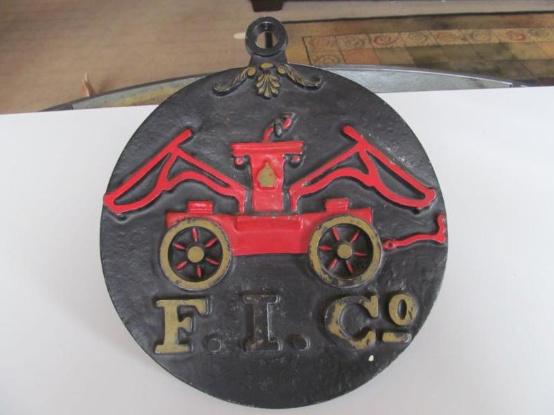 lot 27 image: Firemans insurance Co. wall plaque...