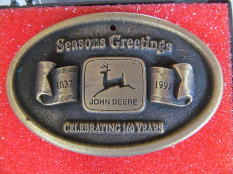 lot 4 image: John Deere belt buckle,brand new...