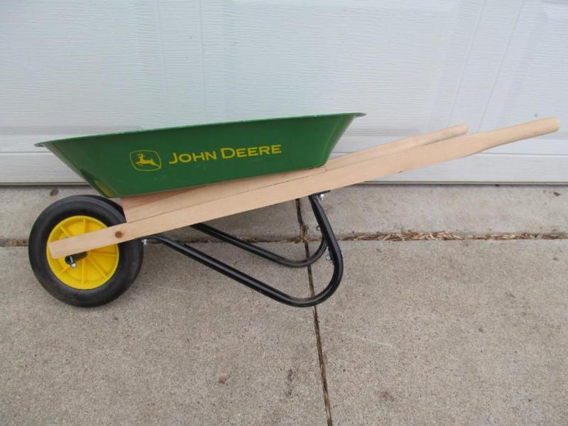 lot 72 image: John Deere childrens wheel barrel,...