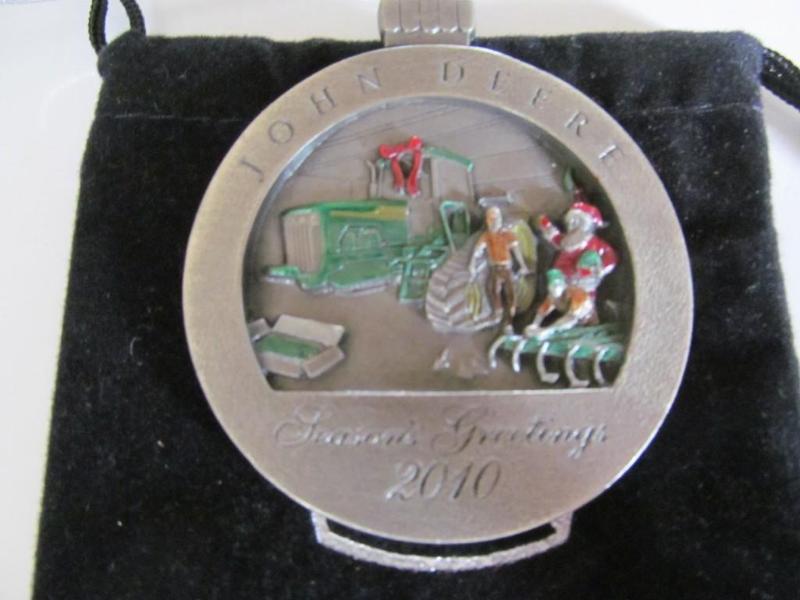 lot 8 image: John Deere Christmas ornament,2010...