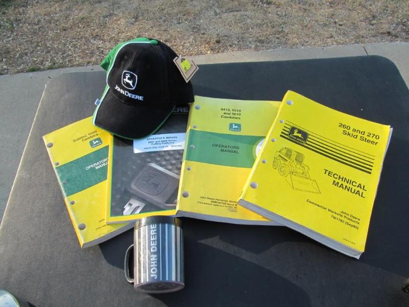 lot 95 image: John Deere manuals,along with extra...