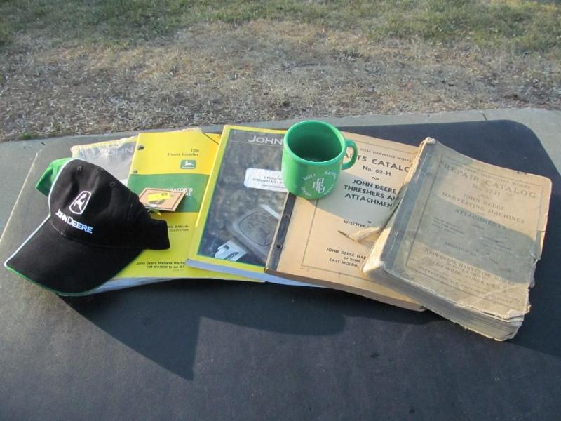 lot 97 image: John Deere manuals,along with extra...