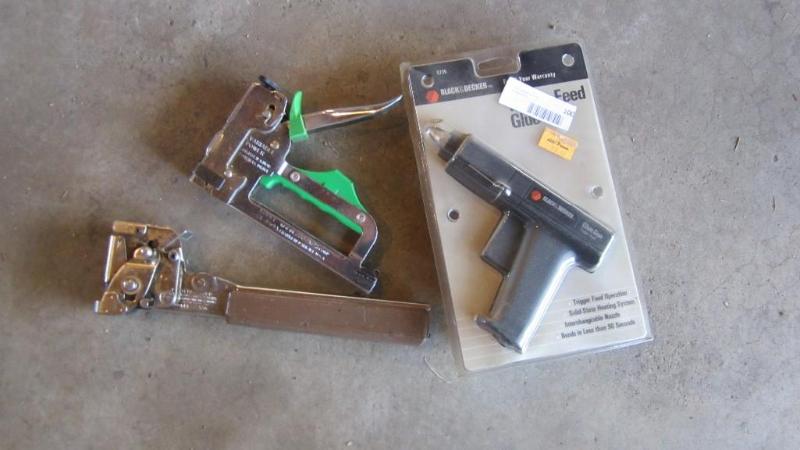 lot 100 image: staplers and glue gun...