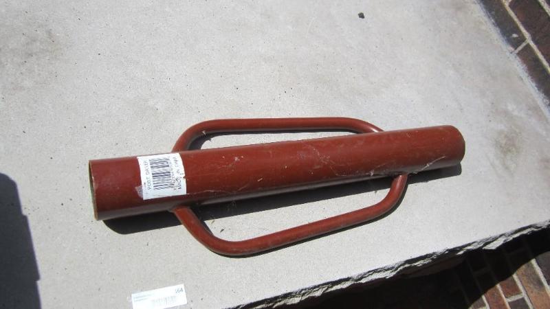 lot 164 image: post hole pounder...
