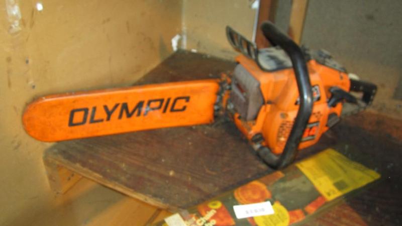 lot 21 image: olympic chainsaw and spare parts...