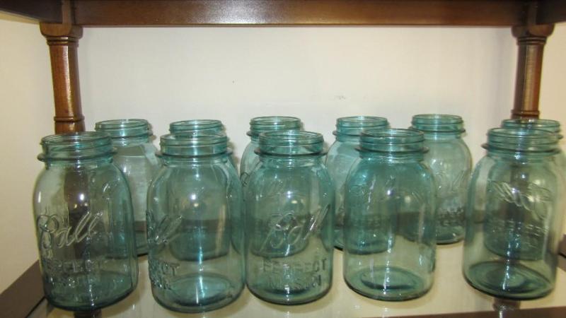 lot 242 image: blue ball jars...