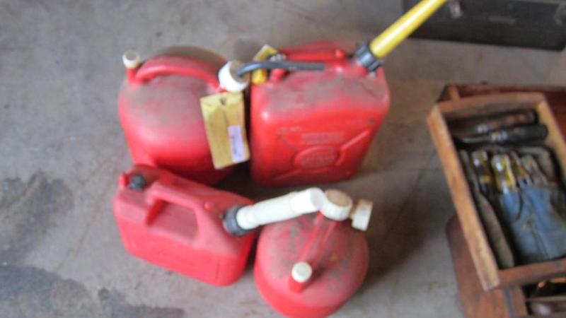 lot 39 image: gas cans, some have gas in them...