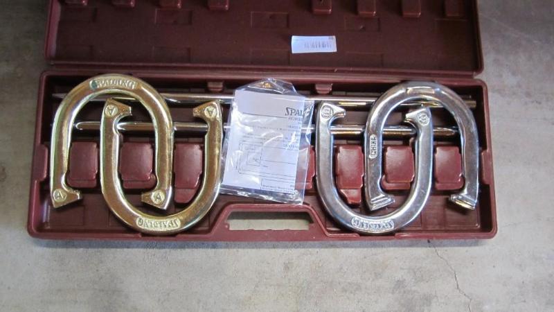 lot 86 image: horseshoe set...