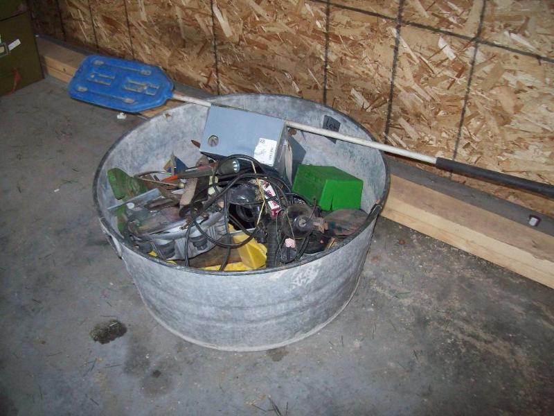 Metal bucket full of odds and ends ...