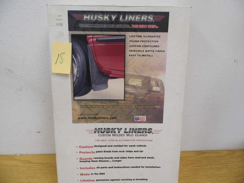 lot 18 image: Husky Liners Custom Molded Mud Guar...