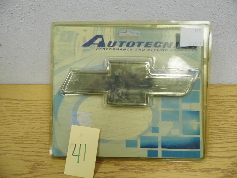 lot 41 image: Chevy Tow Hitch Receiver Cover...