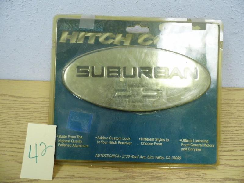lot 42 image: Suburban Tow Hitch Receiver Cover...