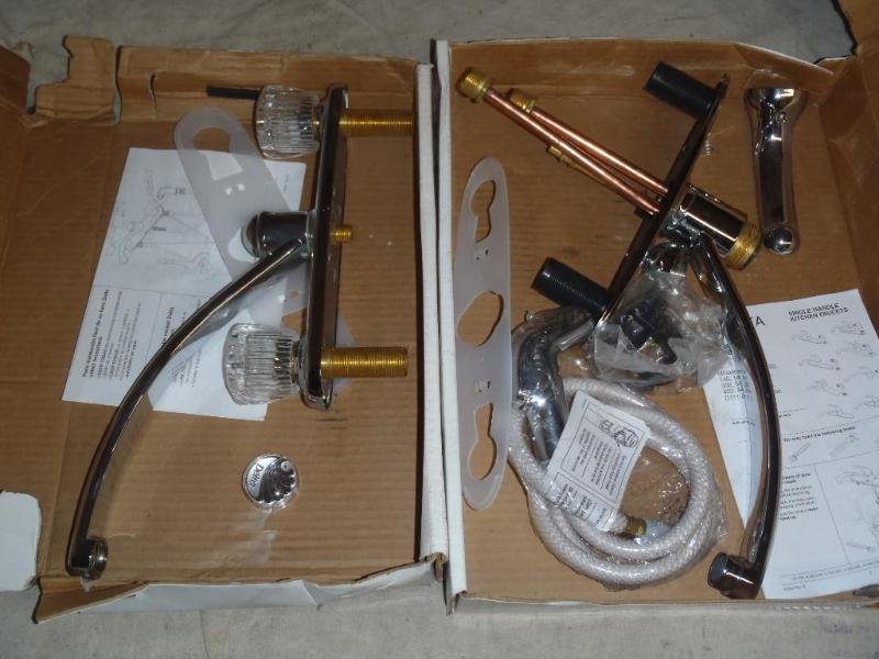 lot 142 image: Delta 2102 and 402-WF Kitchen Fauce...