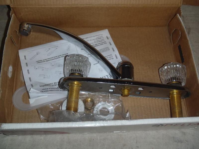 lot 143 image: Delta 2102 Kitchen Faucet.  ...
