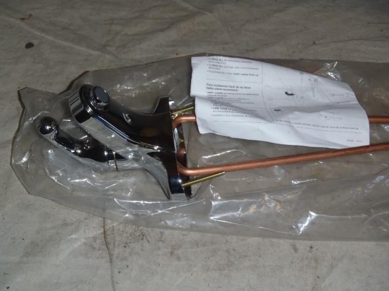lot 199 image: Delta 520 Chrome Sink Faucet.  ...