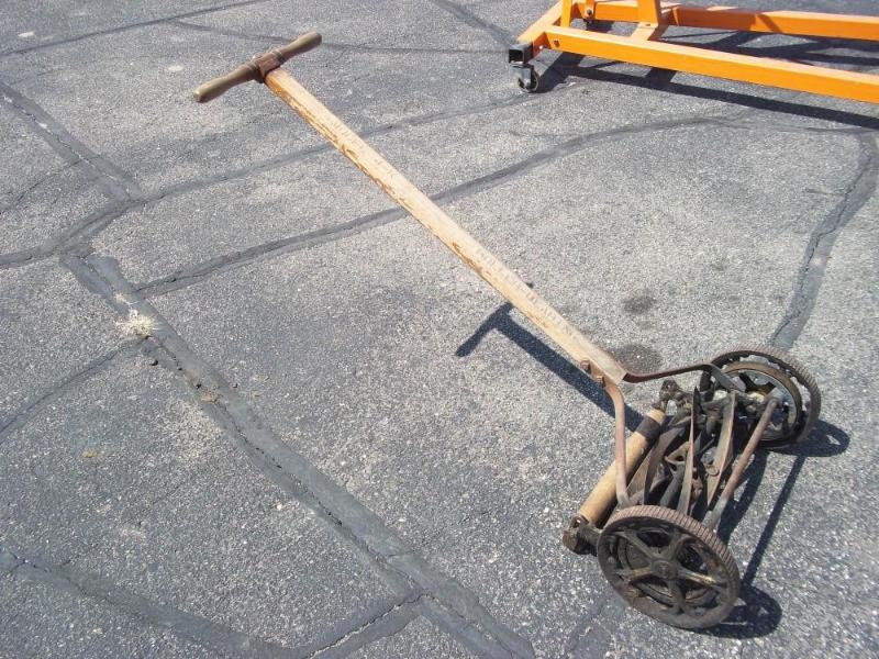 Antique model 4-K push reel mower...