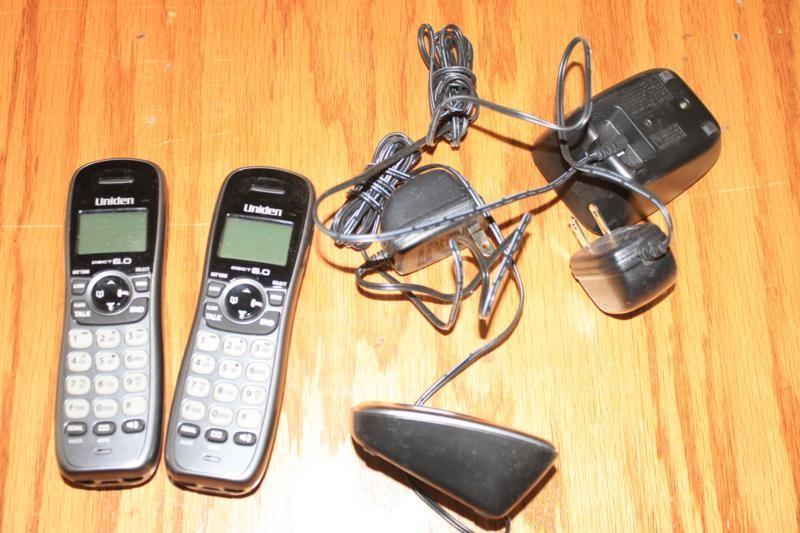lot 129 image: 2 Uniden telephones and chargers , ...
