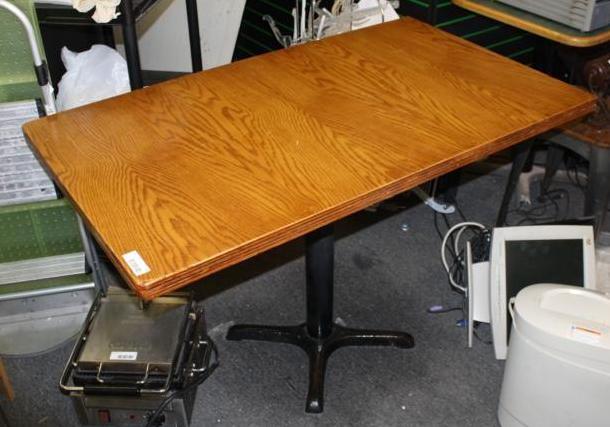 lot 16 image: Stained wood restaurant booth table...