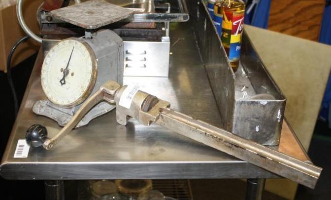 lot 30 image: Vintage scale and commercial can op...