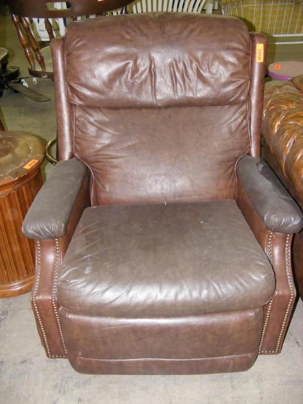 Recliner, brown vinyl some conditi...