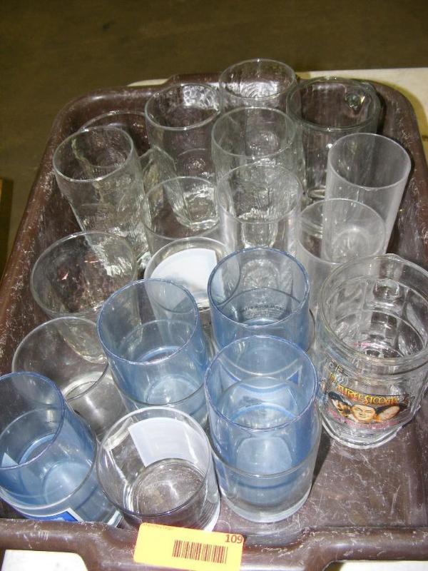 lot of glasses in wash tub...