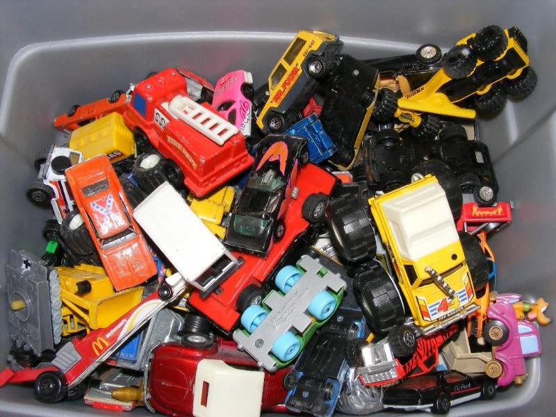 Small tub of toy carstrucks...