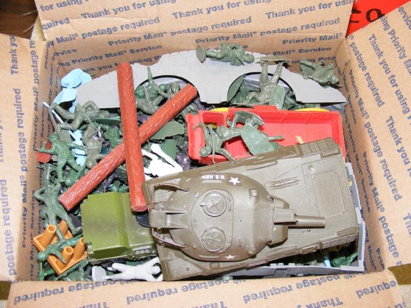 Box of Army Men, a tank and some ot...