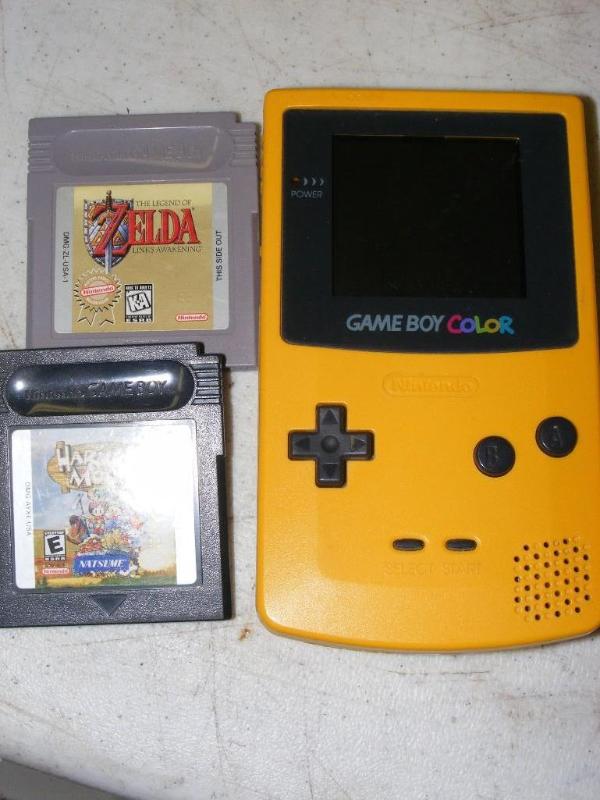 Game Boy Color with three games...