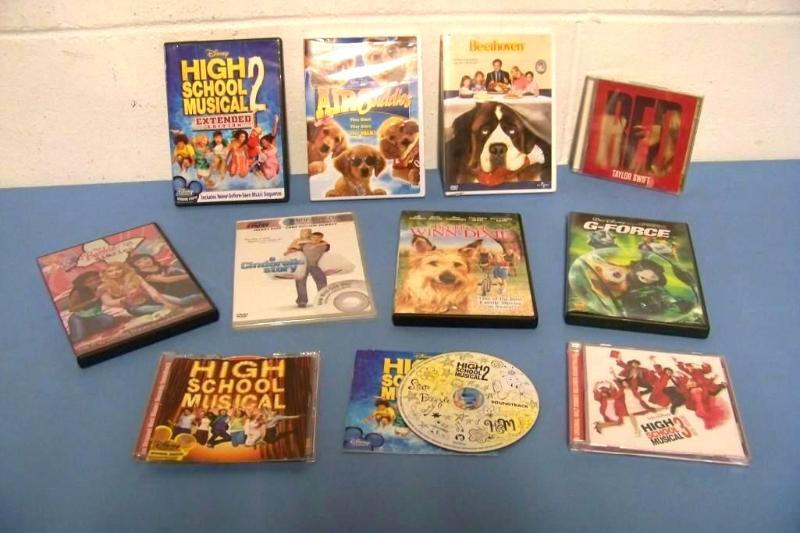 lot 7 image: Disney DVDs and Taylor Swift CD