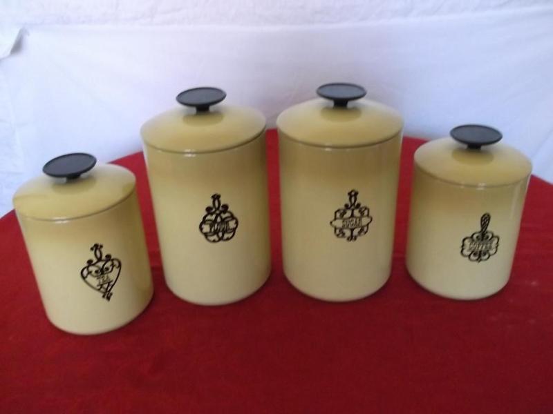 Set of 4 metal canister 10 12&quot...