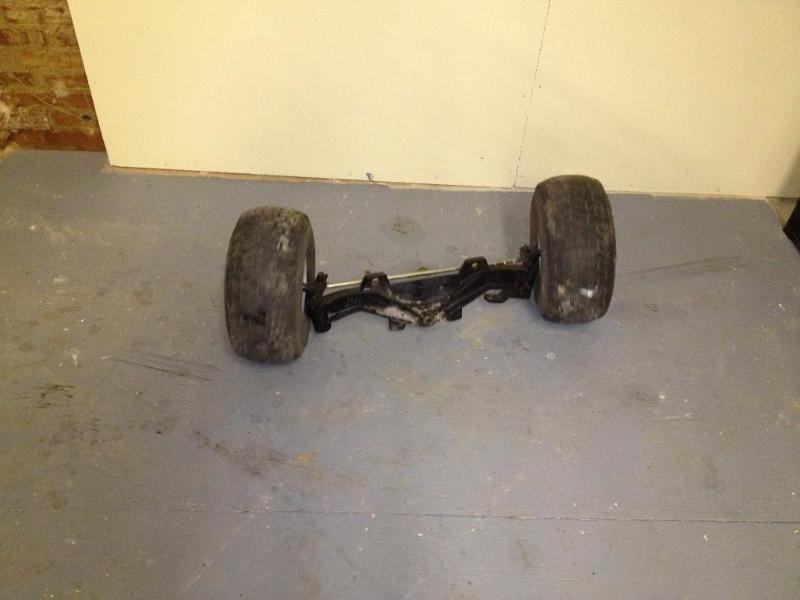 Front axel from a lawnmower, 15x6.50x6 tires