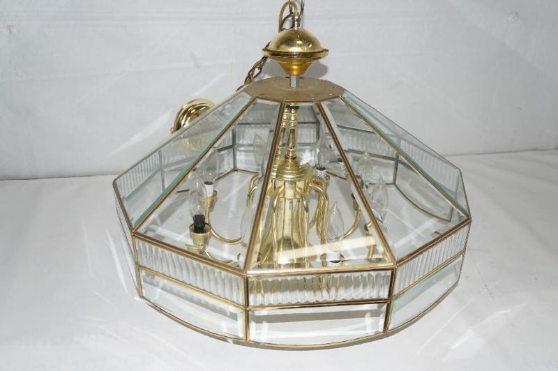 lot 85 image: A hanging glass and brass chandelie...