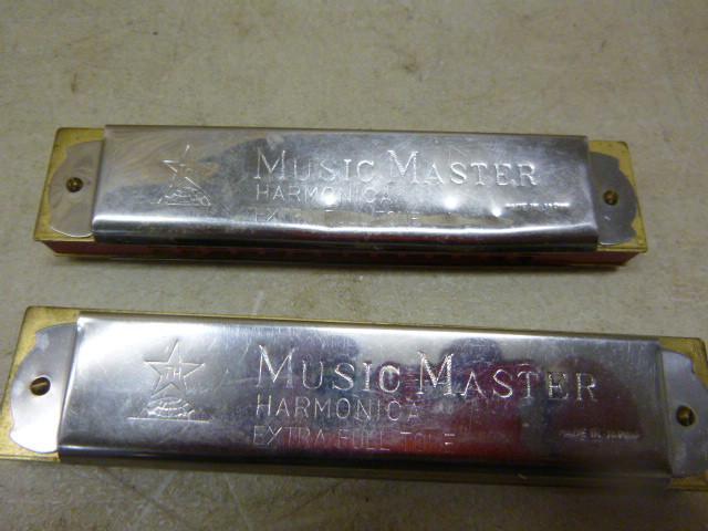 2 Music Master Harmonicas...
