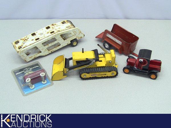 Lot of Vintage Metal Tonka Truck Toys, and a New in the Package Miniature Radio Flyer Wagon