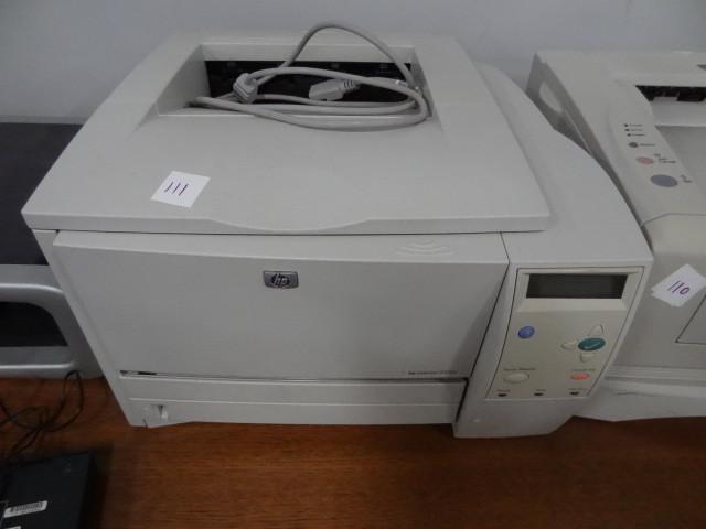 lot 111 image: HP laser jet 2300D printer...