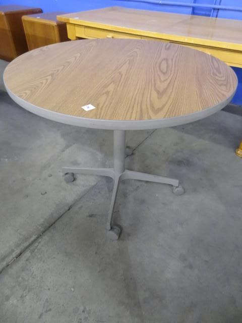 lot 206 image: 36" round table on wheels...