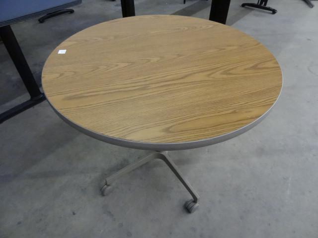 lot 216 image: 36" round table on wheels...