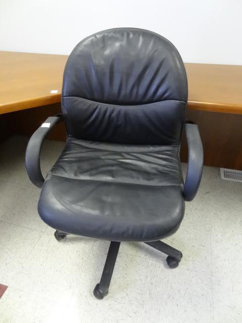 lot 23 image: Office chair on wheels...