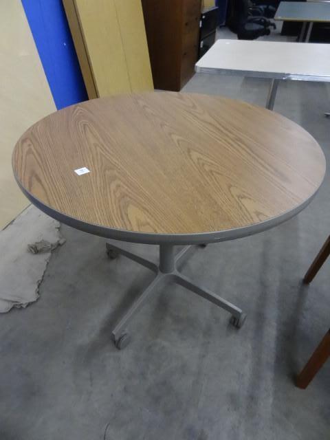 lot 243 image: 36" round table on wheels...