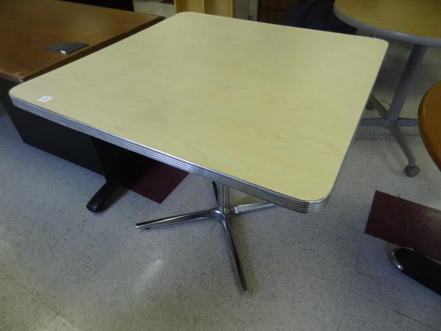 lot 28 image: 36 x 36 table with metal base...