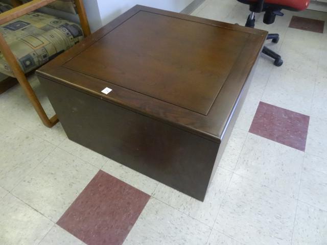 lot 34 image: Wood coffee table. 32 x 32 x 19...