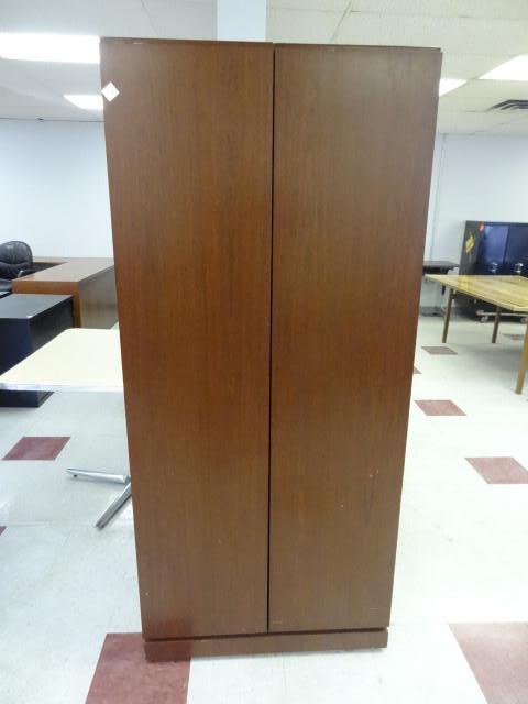 lot 57 image: 2 door wood wardrobe cabinet. 32 x ...